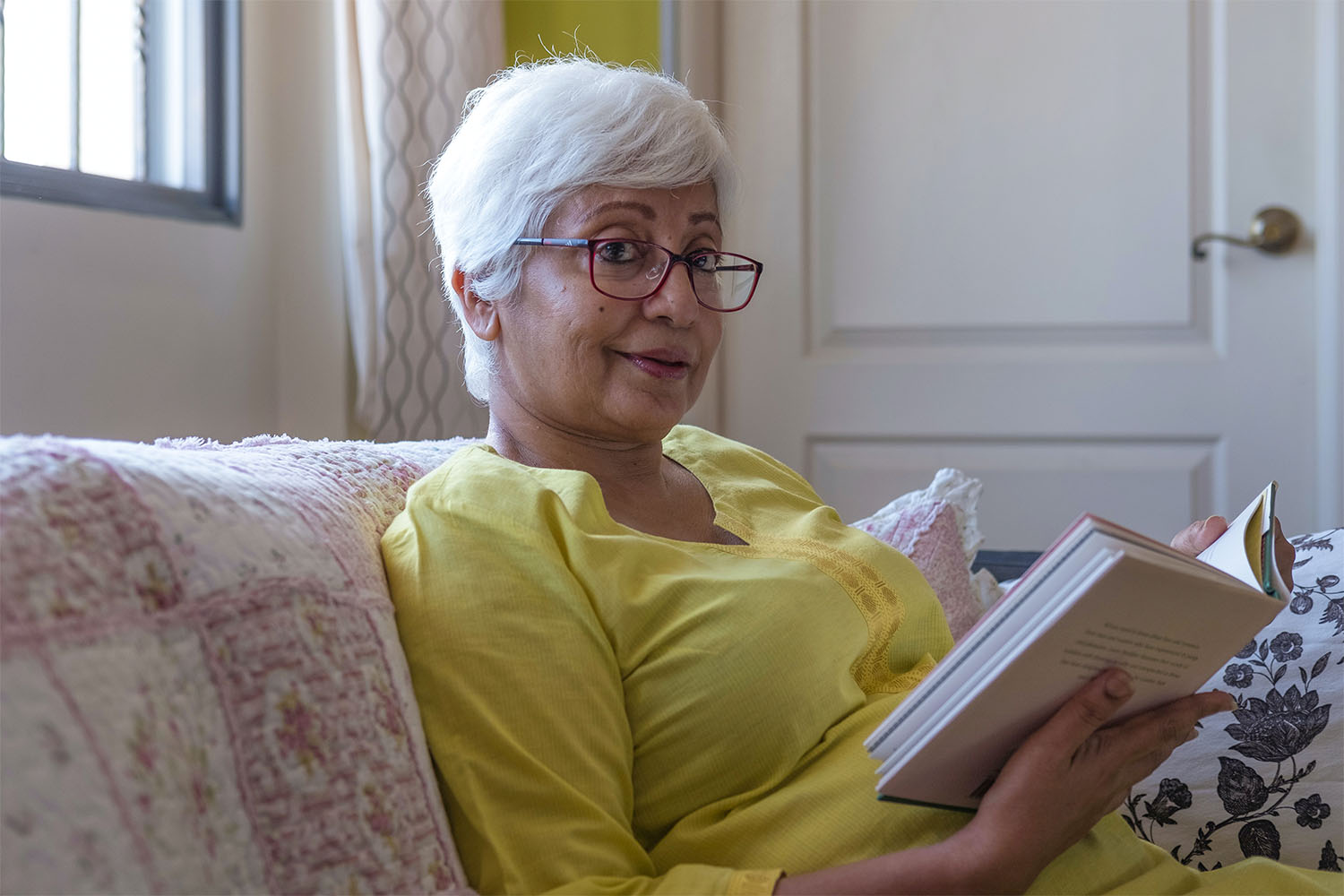 Resident reading a book