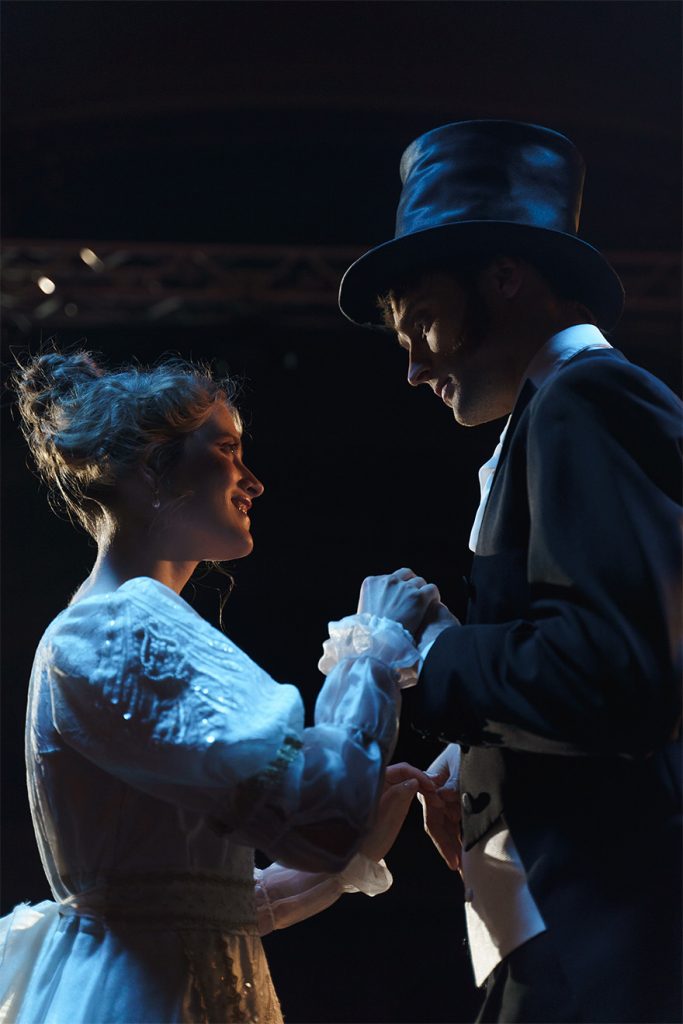actors performing on stage