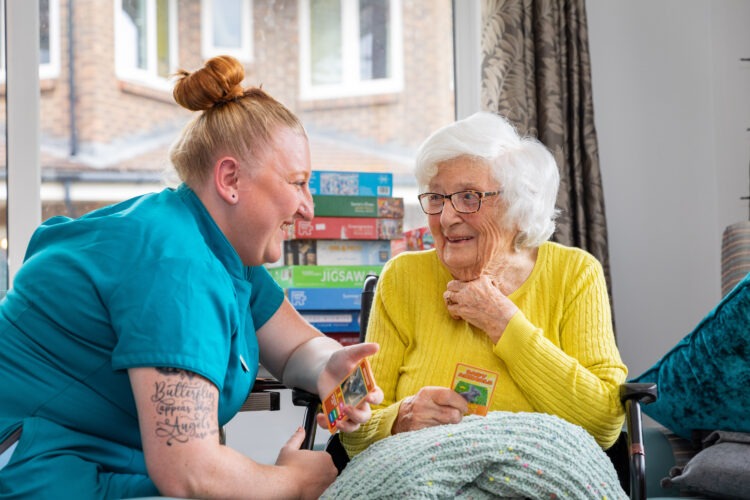 Resident having fun with carer