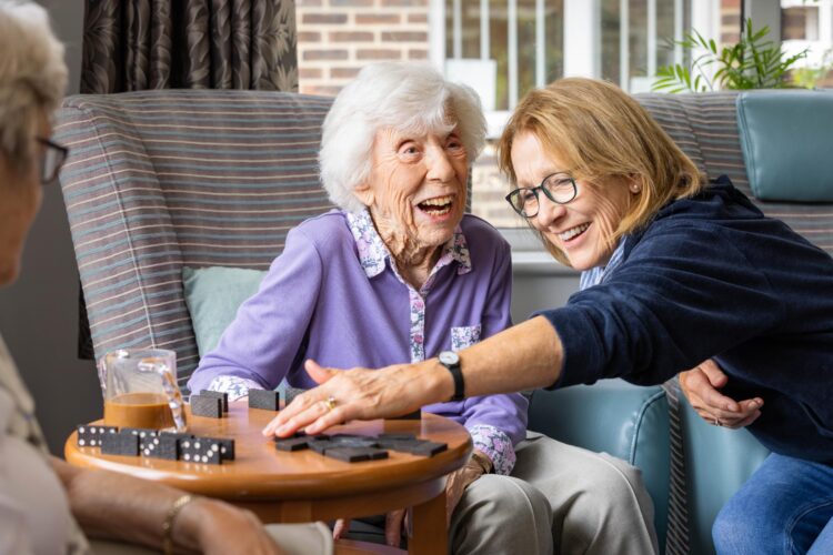 Resident smiling with family