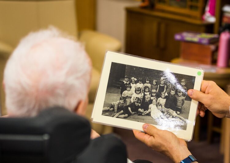 Resident looking at photo