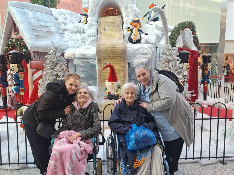 residents on an outing with staff for a festive day out